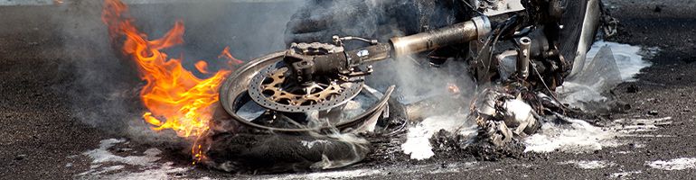 Motorcycle on fire in Sacramento, CA after motorbike accident