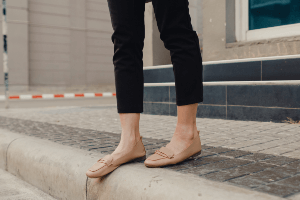 Pedestrian about to jaywalk in illegally in California