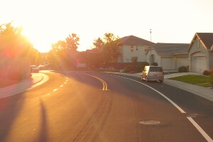 image of neighborhood road at sunset.