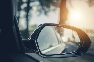 Close up of a vehicles side-view mirror